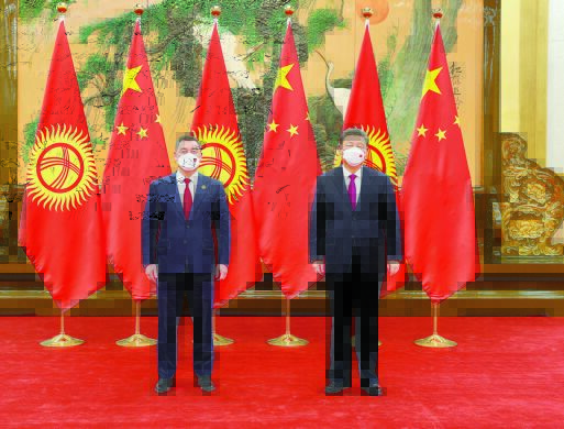 习近平会见李家超